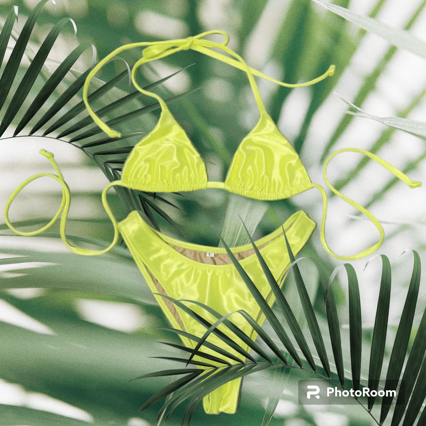 Close-up photo of the neon green Eden bikini set showing the high-saturation color and adjustable ties.