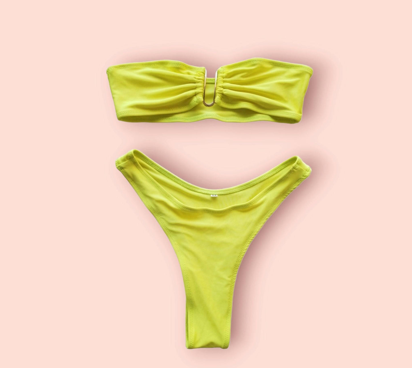 a yellow bikinisuit with a bow on the side