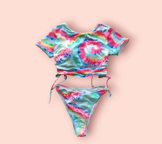 a tie - dyed bikini with a tie - dyed top